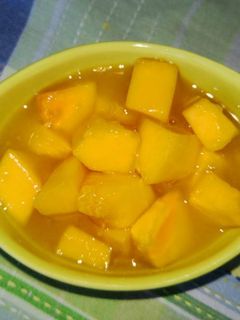 Una foto de Papaya con naranja y miel