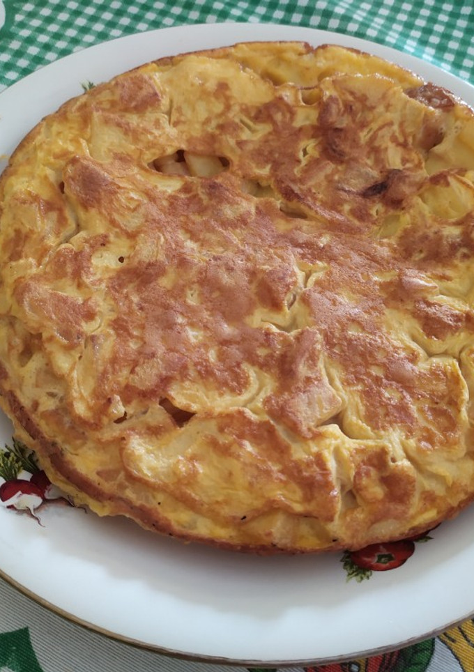 Una foto de Tortilla de patatas con cebolla