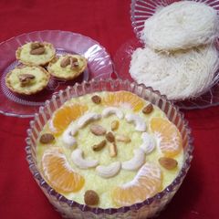 A picture of Kesar feniya tarts/pudding.