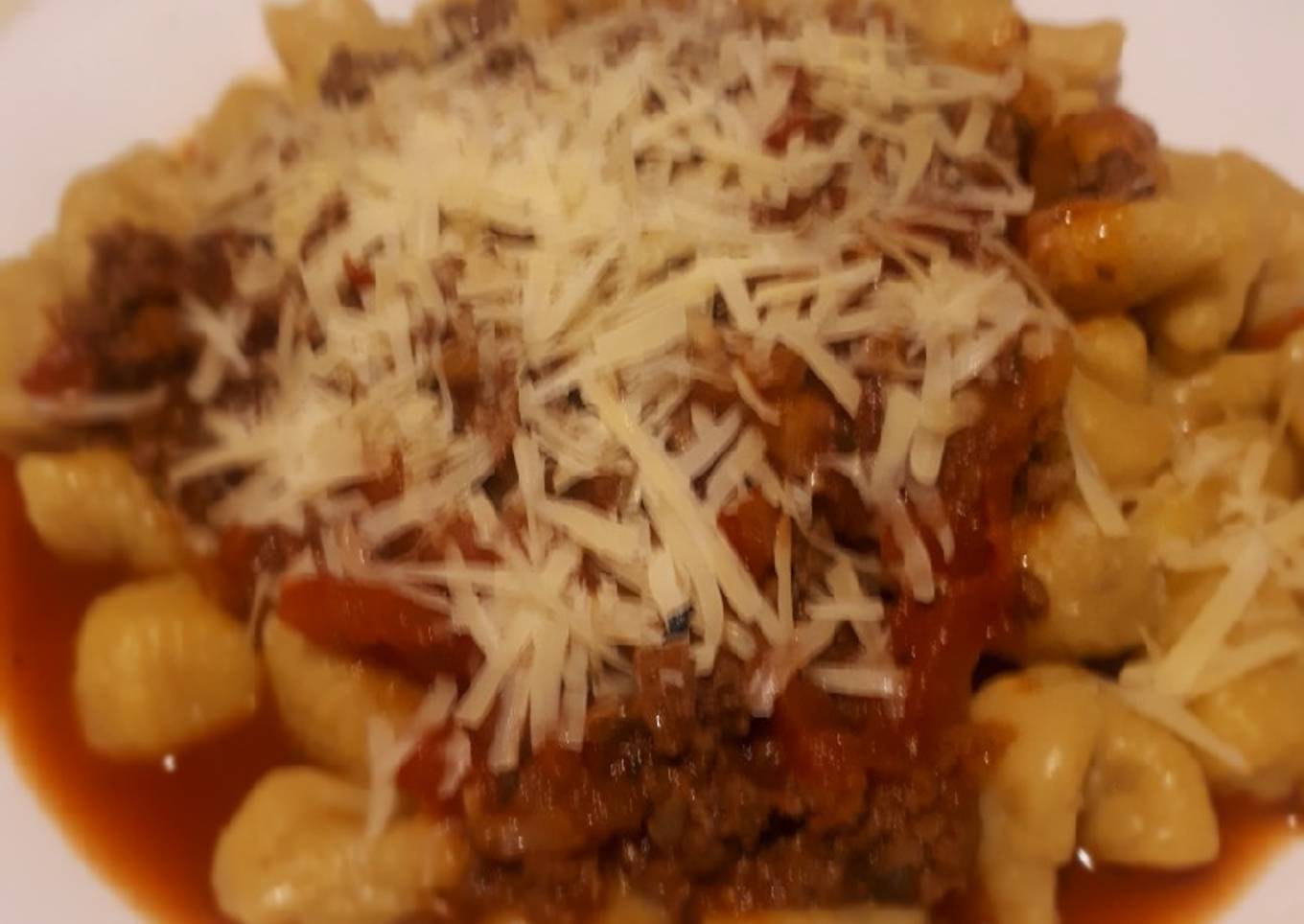 Ñoquis de batata a la boloñesa