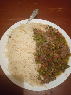 A picture of Spaghetti served with minji+ meat stew.