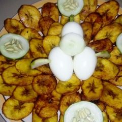 A picture of Fried plantain and boiled eggs.