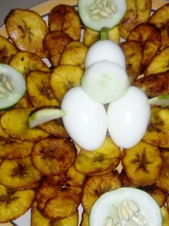 A picture of Fried plantain and boiled eggs.