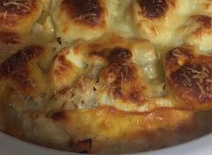 Una foto de Coliflor gratinado en salsa bechamel