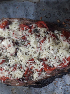 Una foto de Sabalo o boga a la pizza