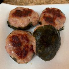A picture of Pork Tsukune with Nori Seaweed.