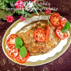 A picture of Punjabi prawns omelette 🥚🍅.