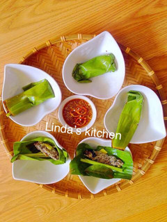 Hình của món Chả ốc hấp lá chuối.