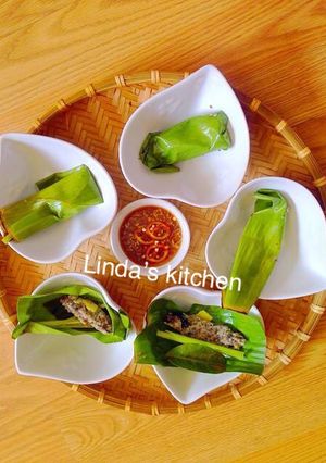 Hình của món Chả ốc hấp lá chuối.