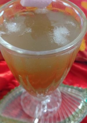 A picture of Peach ice tea and coconut water cocktail.