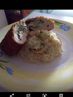 Una foto de Envoltini de pollo con risotto de champiñones