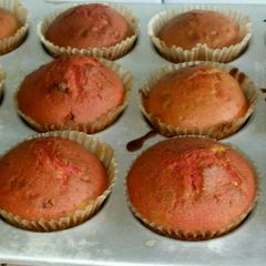 A picture of Mixed coloured cupcakes.