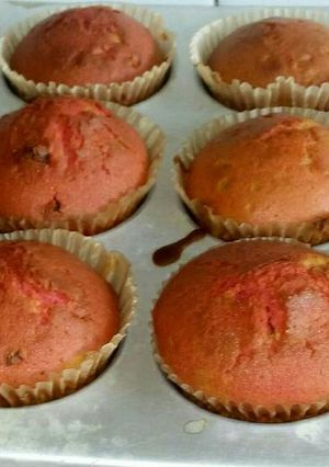 A picture of Mixed coloured cupcakes.