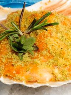 Una foto de Vieiras rellenas gratinadas al champán