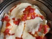 Una foto de crepas de pollo en salsa