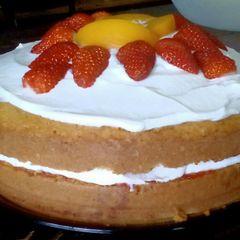 A picture of Victoria Sponge Cake with Creme Fraiche and Fruit Topping.