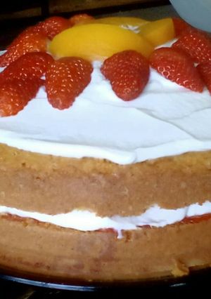 A picture of Victoria Sponge Cake with Creme Fraiche and Fruit Topping.