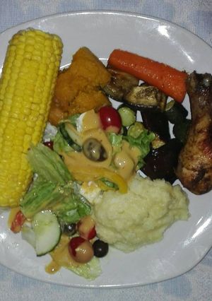 A picture of Greek salad and vegetables.
