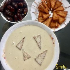 A picture of Almond milk and Sweet Potato Soup served with Croutons.