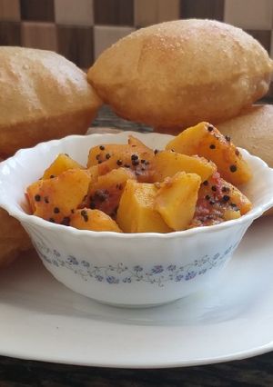 A picture of Potato curry with Poori#authors marathon.