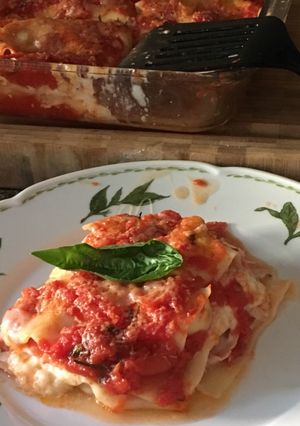 Una foto de Lasagna jamón, muzarela y champiñones