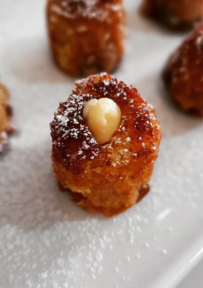 Una foto de Bocaditos de almendra rellenos de crema pastelera (sin gluten)
