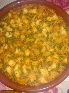 Una foto de Arroz con sepia al horno