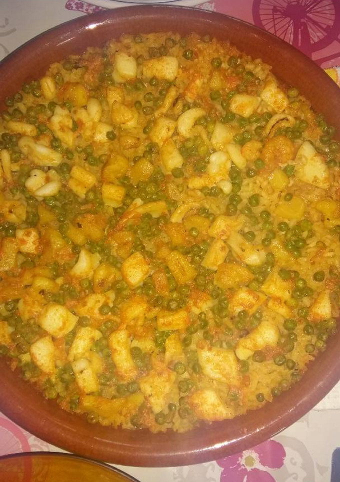Una foto de Arroz con sepia al horno