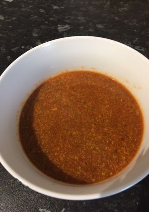 A picture of Broccoli, tomato and smoked garlic soup.