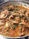 Bisteces entomatados con espinacas