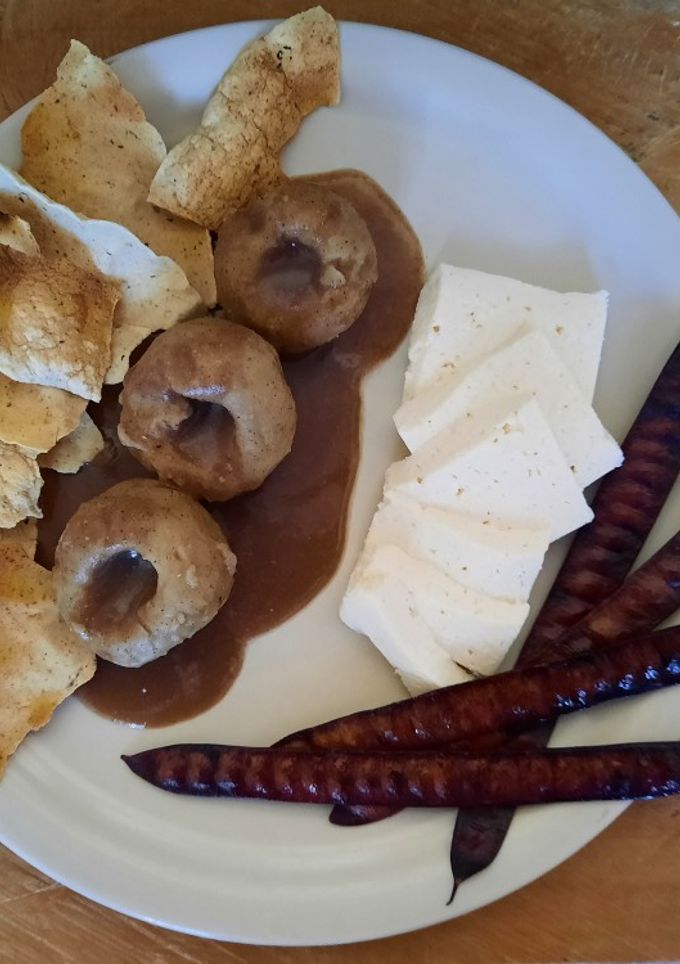 Una foto de Frijol molido con bolitas de masa