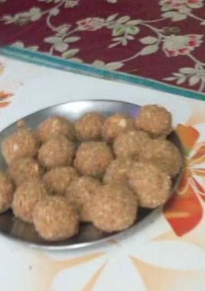 A picture of Almond sesame peanut laddu with jaggery.