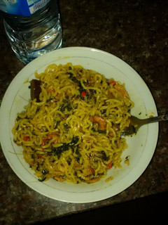 A picture of Indomine with prawns and pumpkin leaves.