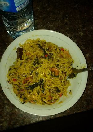 A picture of Indomine with prawns and pumpkin leaves.