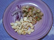 Una foto de ceviche de choclo