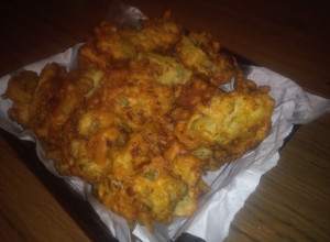Una foto de Buñuelos de cebolla verdeo