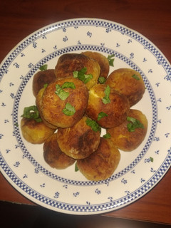 Una foto de Bolitas de plátano maduro con queso