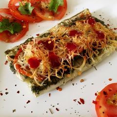 A picture of Lauki Pizza with Pesto.
