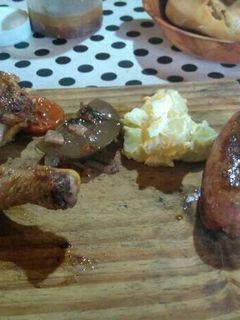 Una foto de Asado a la parrilla clásico con pollo al orégano