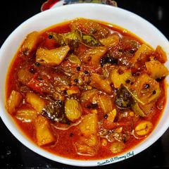 A picture of Pineapple- tomato Khatta meetha.