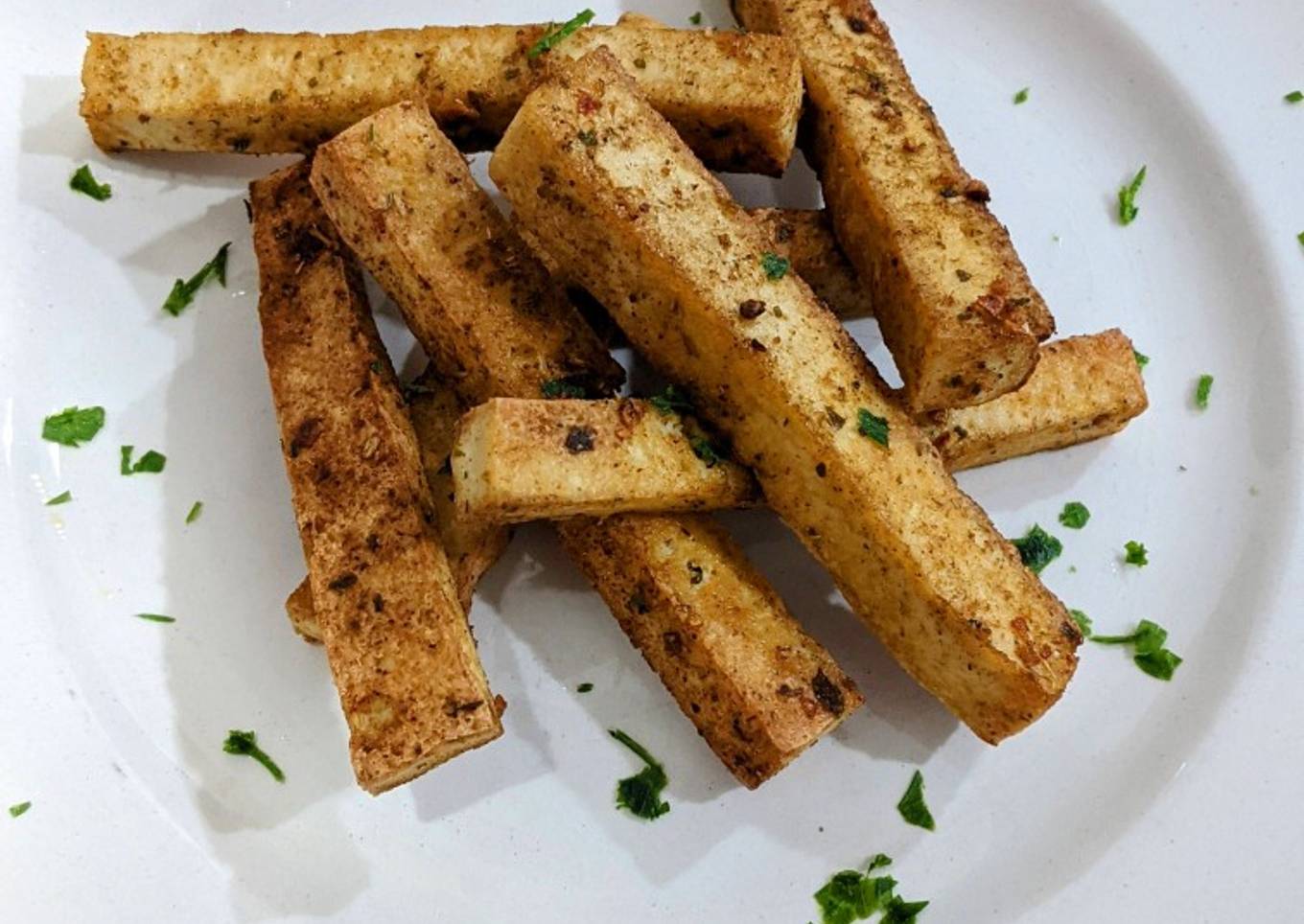 Bastones de tofu salteados al curry