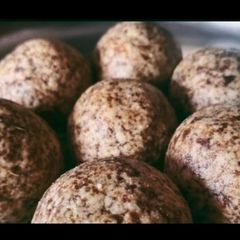 A picture of Cashew nut and badam ladoo.