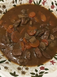 Una foto de Cabezada de cerdo a la bourguignon