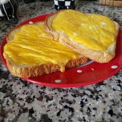 A picture of Breakfast, eggs with toast 🍞🥚.