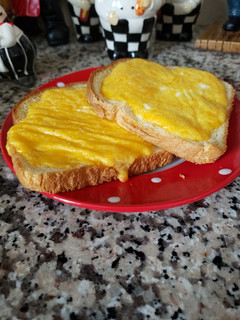 A picture of Breakfast, eggs with toast 🍞🥚.