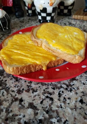 A picture of Breakfast, eggs with toast 🍞🥚.