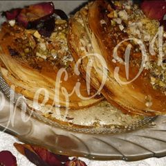 A picture of Dry Fruits Gulkand Baklava....Mediterranean dessert.