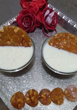 A picture of Rice kheer with caramelized nuts.