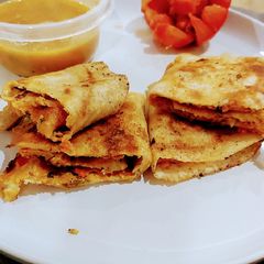 A picture of Egg masala dosa.