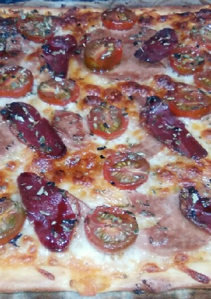 Una foto de Pizza de foie gras y jamón de pato